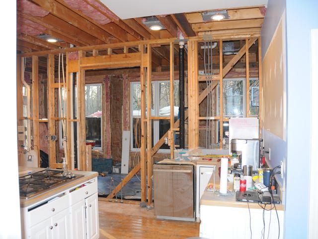 A house under construction with the framing exposed