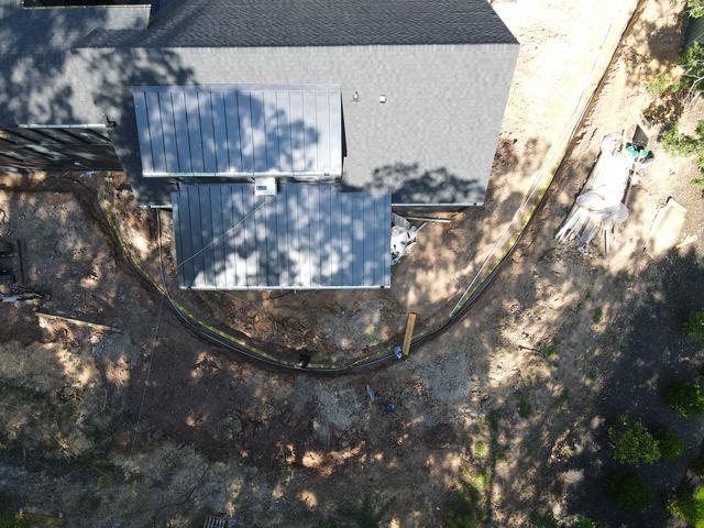 An aerial view of a house under construction