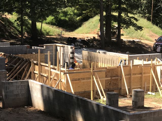 A house under construction with the framing exposed
