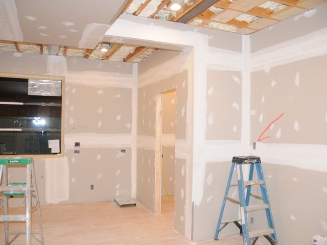 A house under construction with the framing exposed