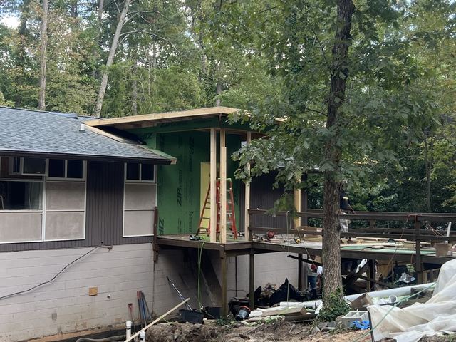 A house under construction with the framing exposed