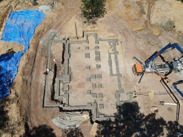An aerial view of a house under construction