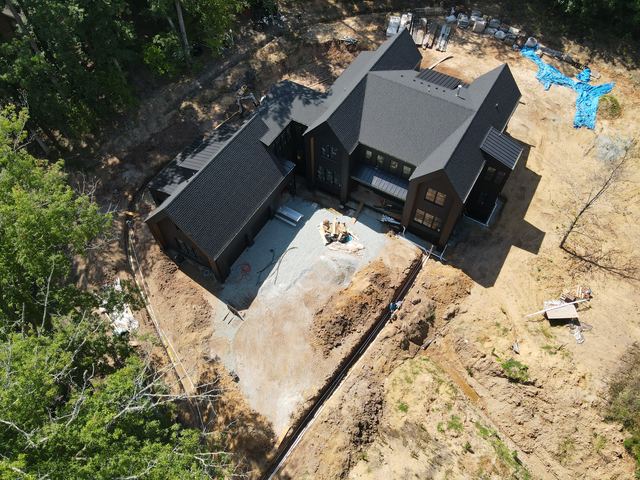 An aerial view of a house under construction