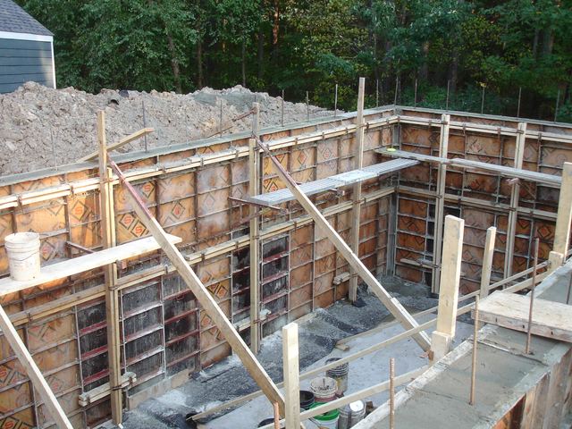 A house under construction with the framing exposed
